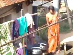 Village bhabhi bathing outdoor